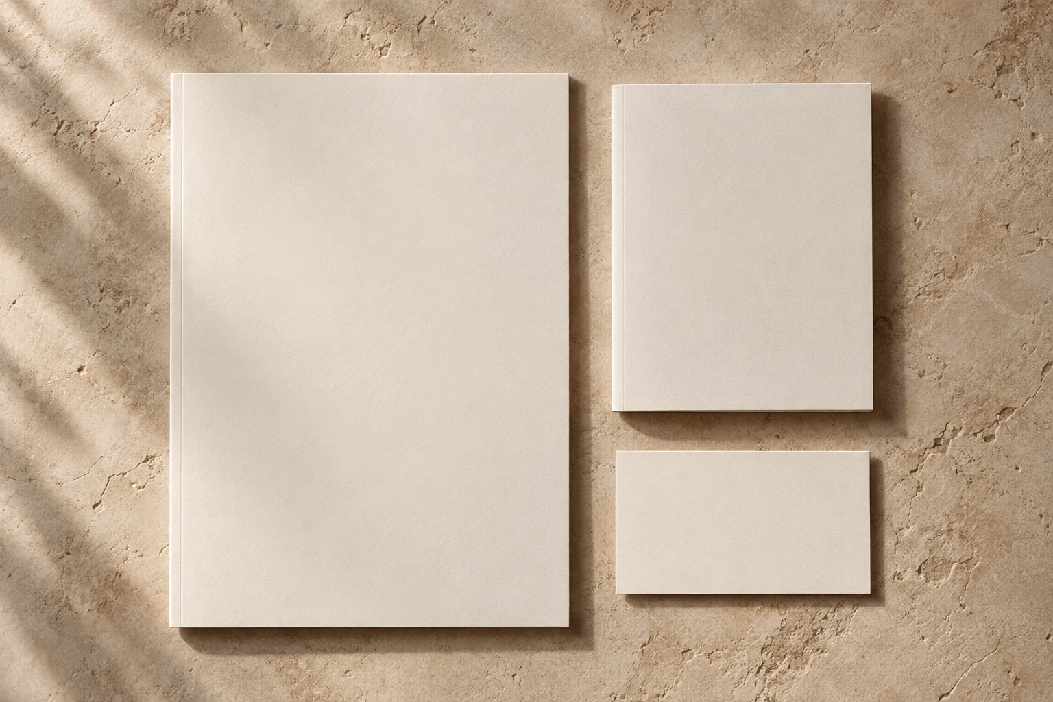Conceptual consultation folder, aftercare booklet and appointment card on limestone